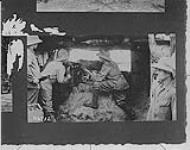 Captured German photo showing Huns working captured British Naval 3 pdr. gun. 1915