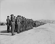 1st Battalion of the Royal Canadian Regiment presenting arms as U.S. President Dwight D. Eisenhower arrives for visit. 3 Dec. 1952