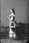 Miss Skead in costume. [between February 24-29, 1876].