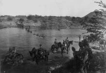 Troops of the Royal Canadian Regiment crossing Paardeberg Drift Feb. 1900