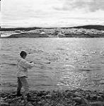 [Barbara Hinds fishing]. [between 1956-1960]