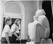Lismer's Children's Art Classes Toronto, Girls Looking at Statue. [ca. 1939-1940]