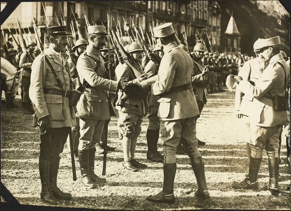 Photograph of  decorations being given to French soldiers, Le Tréport, France, ca. 1916-1917