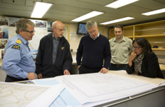 [Prime Minister Stephen Harper and Leona Aglukkaq are briefed on the Franklin expedition during their visit onboard the Sir Wilfrid Laurier coast guard ship with Captain Stuart Aldridge, Douglas Stenton, Director of Heritage for the Government of Nunavut, and Ryan Harris, Senior Marine Archaeologist in Gjoa Haven, Nunavut] 21 August 2013
