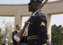 [A Colour Guard passes US President Barack Obama and French President Nicolas Sarkozy during the 65th Anniversary of the D-Day landings in Normandy at the American Cemetery at Colleville-sur-Mer, near Caen, Western France] 6 June 2009