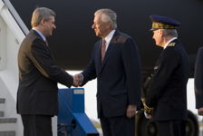 [Prime Minister Stephen Harper is greeted by Marc Lortie, Ambassador of Canada to the French Republic, on arrival in Normandy, France] 5 June 2009