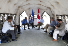 [Prime Minister Stephen Harper hosts a bilateral meeting with Haitian Prime Minister Jean-Max Bellerive and Haitian President René Préval in Port-au-Prince, Haiti] 15 February 2010