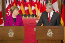 [Prime Minister Stephen Harper holds a joint press conference with Angela Merkel, Chancellor of Germany, on Parliament Hill in Ottawa] 9 February 2015