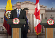 [Prime Minister Stephen Harper and Juan Manuel Santos Calderón, President of Colombia, arrive for a joint news conference at the Casa de Narino in Bogotá, Colombia] 10 August 2011