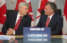 [Prime Minister Stephen Harper discusses the ongoing conflict with ISIS with His Majesty King Abdullah of Jordan at the Canadian Department of National Defence] 29 April 2015
