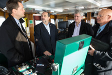 [Prime Minister Stephen Harper and Denis Lebel ride on the Arctic tugboat in Sept-Îles, Quebec] 14 October 2014
