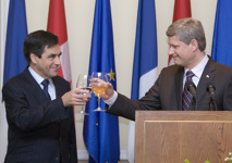 [Prime Minister Stephen Harper and French Prime Minister François Fillon offer toasts during a dinner at the Château Laurier in Ottawa] 2 July 2008