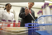 [Prime Minister Stephen Harper uses a pipette during a tour of the new International Vaccine Centre at the University of Saskatchewan, Canada's newest research facility for vaccine research and development] 16 September 2011