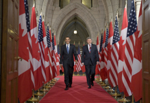 [US President Barack Obama and Prime Minister Stephen Harper walk to a press conference on Parliament Hill in Ottawa] 19 February 2009