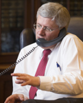 [Prime Minister Stephen Harper speaks to US President Barack Obama on the phone from his Langevin Block office in Ottawa] 16 October 2014