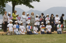 [Laureen Harper poses for a photo with children after planting a tree in Hokaido, Japan during the G8 Summit] 8 July 2008