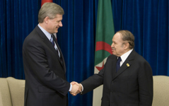 [Prime Minister Stephen Harper, left, speaks to Algerian President Abdelaziz Bouteflika during a bilateral meeting as part of the Sommet de la Francophonie in Québec City] 18 October 2008