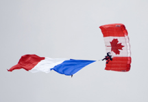 [A skydiver floats overhead at the Canadian National Vimy Memorial prior to the ceremony in Vimy, France] 9 April 2007