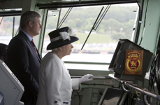 [Prime Minister Stephen Harper and Her Majesty Queen Elizabeth II tour the bridge of the HMCS St. John's during a fleet review of 28 Canadian and foreign warships at anchor in Bedford Basin and Halifax Harbor] 29 June 2010