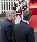 [Prime Minister Stephen Harper walks with British Prime Minister David Cameron en route to a working luncheon at the G8 Summit in Deauville, France] 27 May 2011