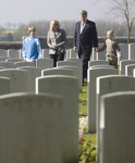 [Prime Minister Stephen Harper and his family walk through a sea of headstones of the fallen unknown soldiers near the Vimy Memorial National Historic Site in Vimy, France] 8 April 2007