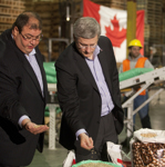 [Prime Minister Stephen Harper is shown a variety of food products by Murad Al-Katib, the CEO of Alliance Grain Traders in Regina, Saskatchewan] 7 October 2011