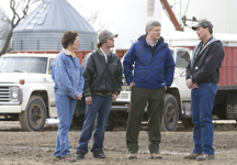 [Prime Minister Stephen Harper chats with Patricia, Brendan and Faron Jones at their family farm before announcing the government's plan to help Canadian farmers access credit and receive loans during an event in Edgeley, Saskatchewan] 1 May 2009