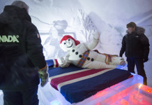[Prime Minister Stephen Harper visits the Hôtel de Glace with Bonhomme Carnaval, the official mascot of the Québec Winter Carnaval, as part of his two-day winter tour in Québec City] 13 February 2015