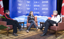 [Prime Minister Stephen Harper and Gary Lunn visit with 5-time gold medallist Lauren Woolstencroft at the Paralympic 2010 Games in Whistler, British Columbia] 21 March 2010