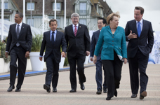 [US President Barack Obama, French President Nicolas Sarkozy, Prime Minister Stephen Harper and Japanese Prime Minister Naoto Kan follow German Chancellor Angela Merkel and British Prime Minister David Cameron to the opening session at the G8 Summit in Deauville, France] 26 May 2011