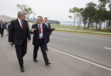 [Prime Minister Stephen Harper walks with Ed Fast, Minister of International Trade and Minister for the Asia-Pacific Gateway, on Russky Island during the APEC Summit in Vladivostok, Russia] 7 September 2012