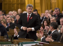 [Prime Minister Stephen Harper votes in favour of the government's motion to call Québécois' a nation within a nation during votes on Parliament Hill in Ottawa] 27 November 2006
