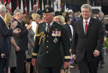 [Prime Minister Stephen Harper follows His Royal Highness the Prince of Wales to a reception following a royal tour event at the Fort York Armoury in Toronto] 22 May 2012