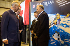 [Prince Charles and Prime Minister Stephen Harper chat with Walter Natynczyk during an aerospace and aviation event at Stevenson Hangar in Winnipeg, Manitoba] 21 May 2014
