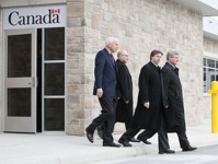 [Prime Minister Stephen Harper is joined by Shawn Graham, Premier of New Brunswick, David Jacobson, United States Ambassador to Canada, and Greg Thompson for the opening of a new border crossing in St. Stephen, New Brunswick] 8 January 2010