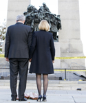 [Prime Minister Stephen Harper and his wife Laureen Harper pay their respect at the National War Memorial the day after the attacks in the nation's capital] 23 October 2014