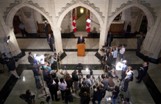 [Prime Minister Stephen Harper talks to the media about the sudden passing of Jack Layton, the plane crash in Resolute and the situation in Libya during a press conference in Centre Block on Parliament Hill] 22 August 2011