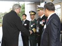 [Prime Minister Stephen Harper is greeted at the War Museum of Korea by Colonel Jacques Morneau, Canadian Defence Attache in Seoul, South Korea] 10 November 2010