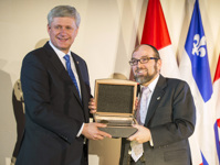 [Prime Minister Stephen Harper, joined by Rabbi Saul Emanuel, receives the King David Award in honour of his principled support of Israel and Jewish communities worldwide during the King David Award Gala, hosted by the Jewish Community Council of Montréal in Montréal, Quebec] 21 May 2015