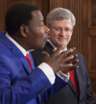 [Prime Minister Stephen Harper listens as African Union leader and Benin President Thomas Boni Yayi talks to the media during his working visit to Ottawa] 8 January 2013