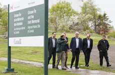 [Prime Minister Stephen Harper, joined by Denis Lebel, Maxime Bernier, Jacques Gourde and Blake Richards chat in the holding room at the Irish Memorial National Historic Site in Grosse Île, Quebec] 22 May 2015