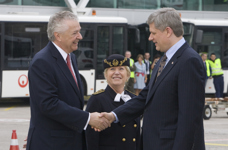 [Prime Minister Stephen Harper shakes hands with Canada's Ambassador to France Marc Lortie as he arrives in France for the NATO Summit in Strasbourg, France] 3 April 2009