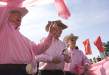 [Prime Minister Stephen Harper cuts the starting ribbon for the Calgary Stampede Parade in Calgary, Alberta] 6 July 2007