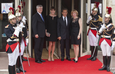 [Prime Minister Stephen Harper and his wife Laureen Harper are greeted by French President Nicolas Sarkozy, President of France, and his wife Carla Bruni-Sarkozy, prior to an official dinner during the G8 Summit in Deauville] 26 May 2011
