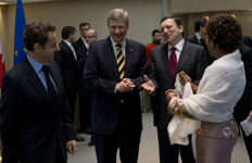 [French President Nicolas Sarkozy, Prime Minister Stephen Harper, President of the European Commission José Manuel Barroso and Governor General Michaëlle Jean, share a laugh during a meeting at the Citadelle in Québec City] 17 October 2008