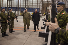 [Prime Minister Stephen Harper is escorted through an Honour Guard at 5 Wing Goose Bay following an event in Happy Valley-Goose Bay, Newfoundland] 30 November 2012