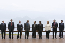 [Heads of states pose for a group picture on the second day of the G8 Hokkaido Toyako Summit at the Windsor Hotel Toya in Japan] 7 July 2008