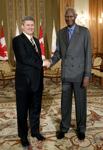 [Prime Minister Stephen Harper meets with Abdou Diouf, Secretary General of l'Organisation Internationale de la Francophonie in the Parliament Buildings in Bucharest, Romania] 27 September 2006