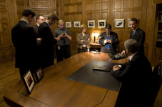 [PMO staff chat with Prime Minister Stephen Harper following the PM's address to the nation on Parliament Hill] 3 December 2008