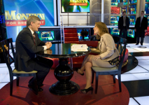 [Prime Minister Stephen Harper chats with Money for Breakfast host Alexis Glick during an interview in New York City] 23 February 2009